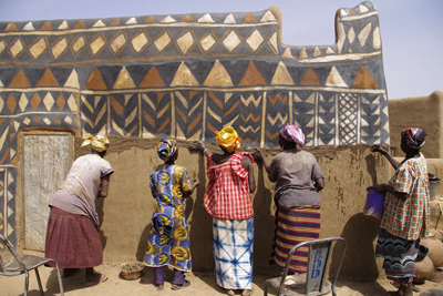 Painting the wall by women