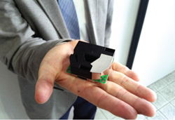 写真1:手のひらサイズのPM2.5測定装置