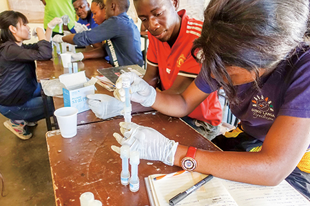 Photo 1 Workshop in Zambia: Collecting samples and processing (photo by KATAOKA Yoshimi)